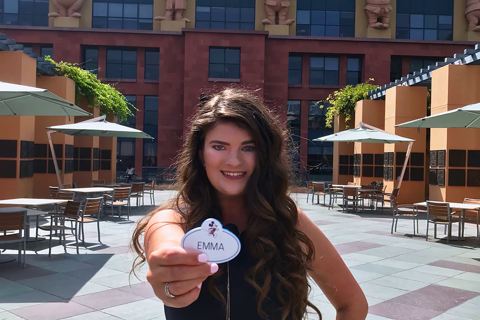 alum in front of disney casting building