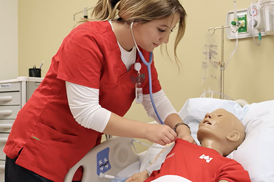 Nursing student in the simulation lab
