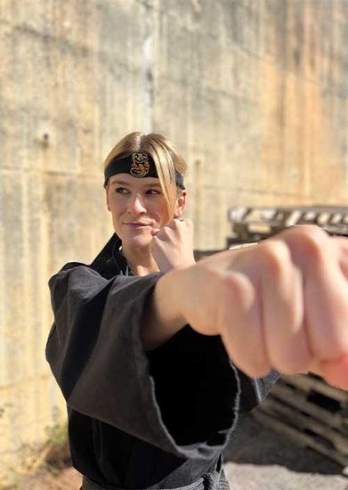 Phoebe behind the scenes of Cobra Kai