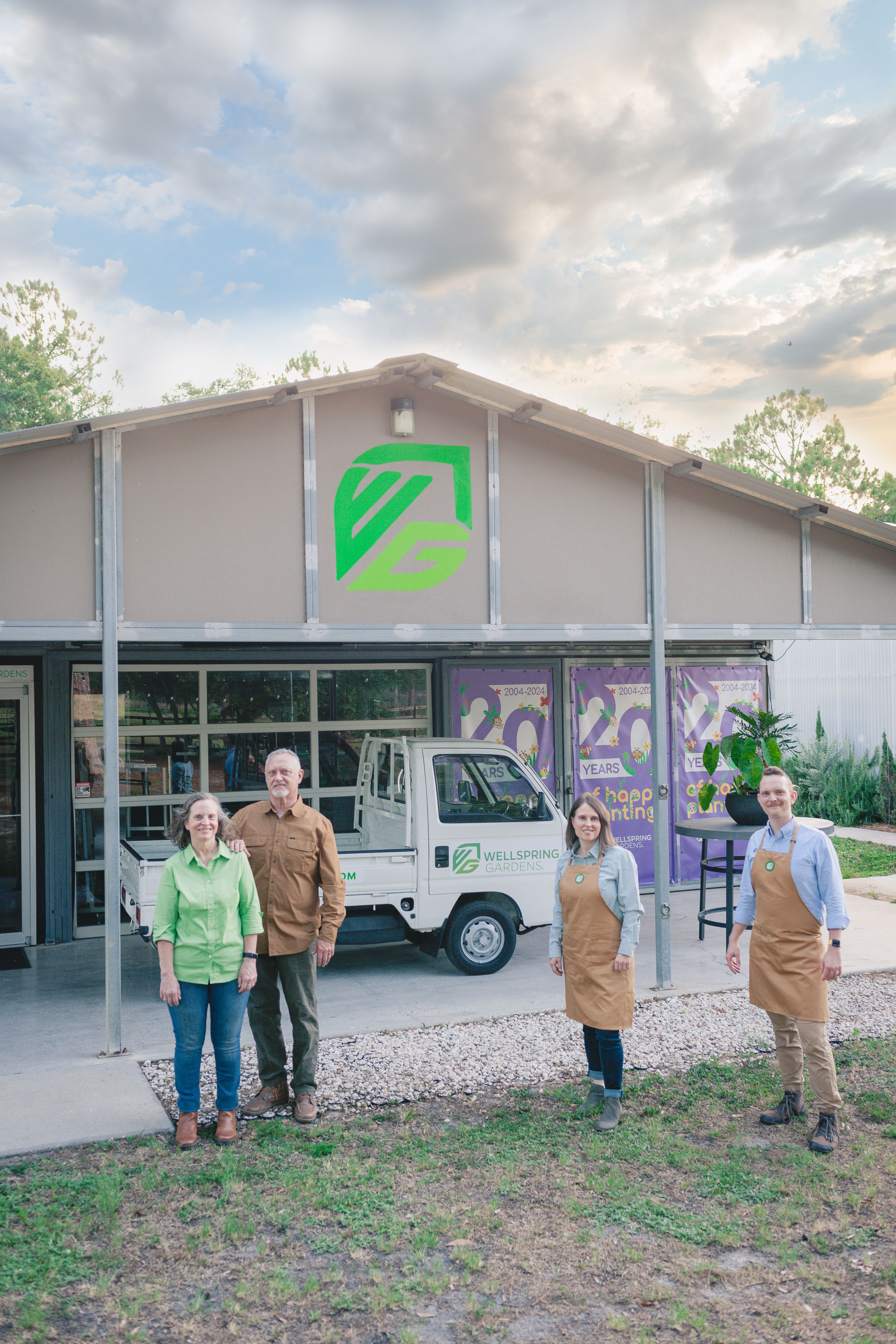 the Baltich family in front of their farm