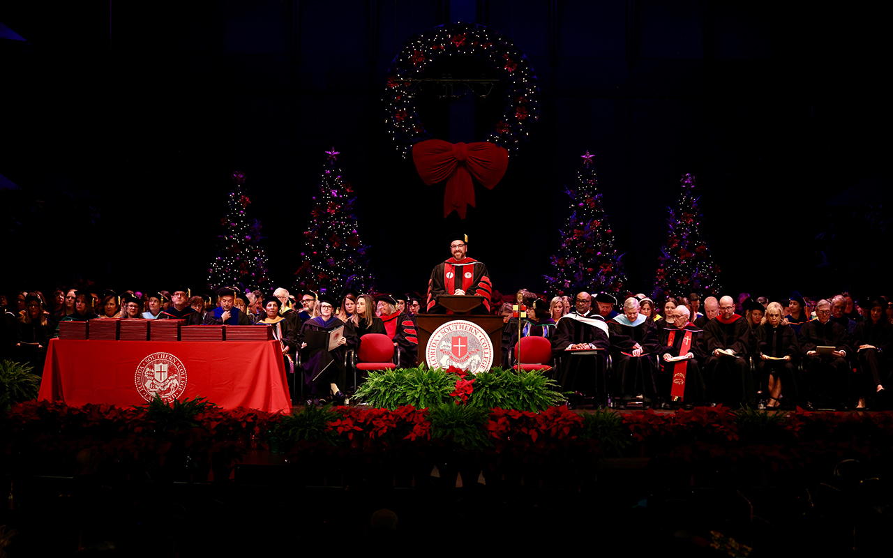 President Martin at the podium on stage